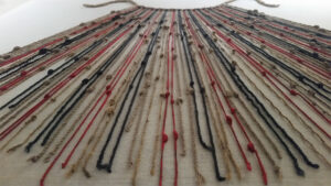 Peruvian quipu showing colored strings and knots